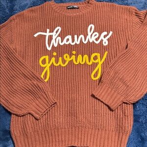 SHEIN Rust Sweater with Festive Text